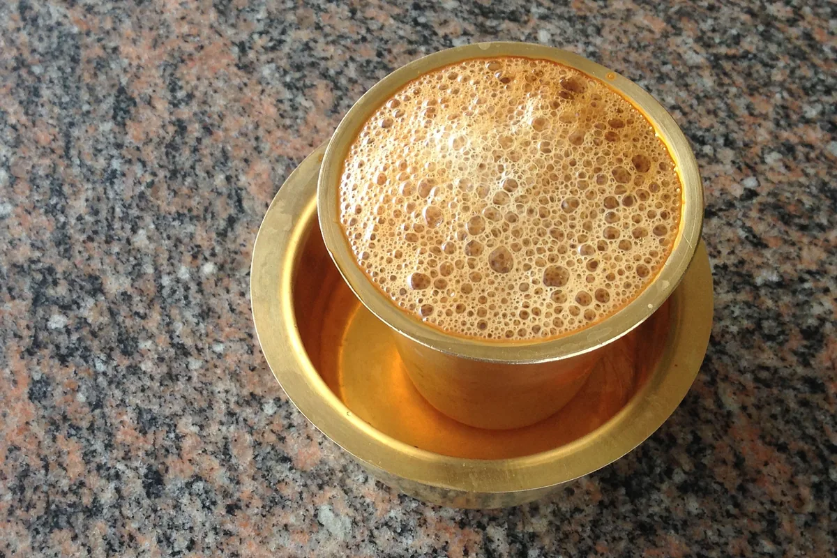 South Indian filter coffee served in a traditional metal cup